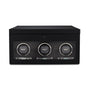 The WOLF British Racing Triple Watch Winder with Storage features a black rectangular design, three circular watch slots, each marked with the WOLF logo, and a glass front panel.