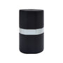 A black cylindrical container called The Rocket by WOLF, featuring a metallic silver band with the WOLF logo in the center.