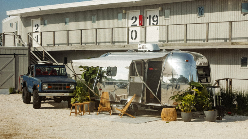Ford truck and silver airstream in Montauk for Time Travel series