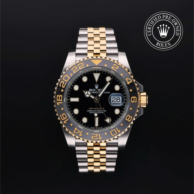 Rolex Certified Pre-owned GMT M126713GRNR-0001 front on black background