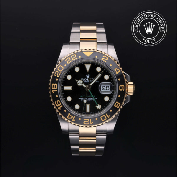 Rolex Certified Pre-owned GMT M116713LN-0001 front on black background