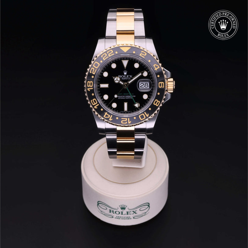 Rolex Certified Pre-owned GMT M116713LN-0001 front on black background