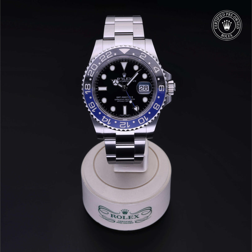 Rolex Certified Pre-owned GMT M116710BLNR-0002 front on black background