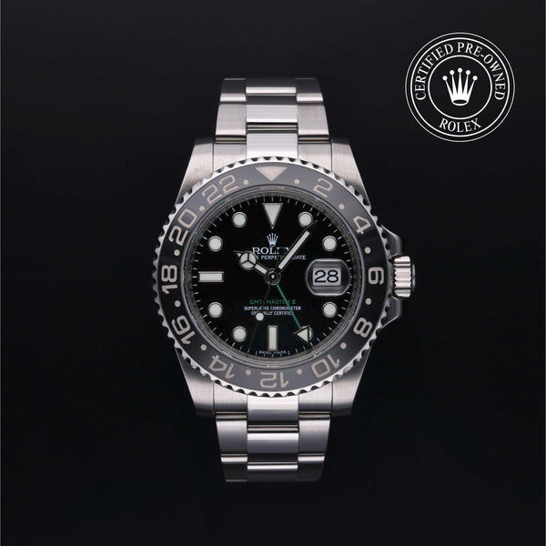 Rolex Certified Pre-owned GMT II M116710LN-0001 front on black background