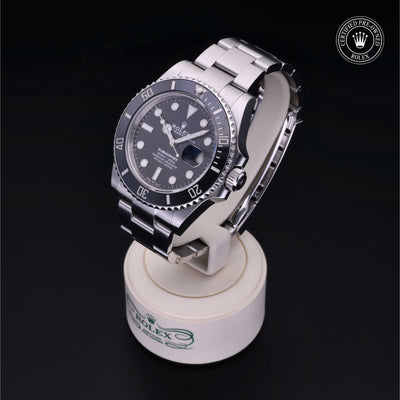 Rolex Certified Pre-owned Submariner Date M126610LN-0001 front on black background