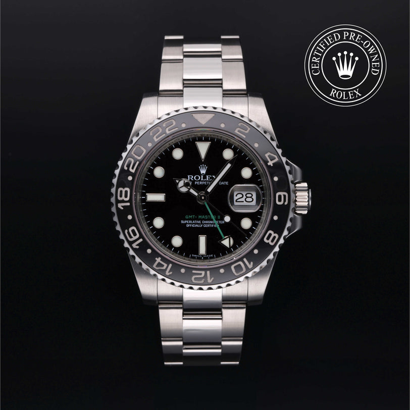 Rolex Certified Pre-owned GMT II M116710LN-0001 front on black background
