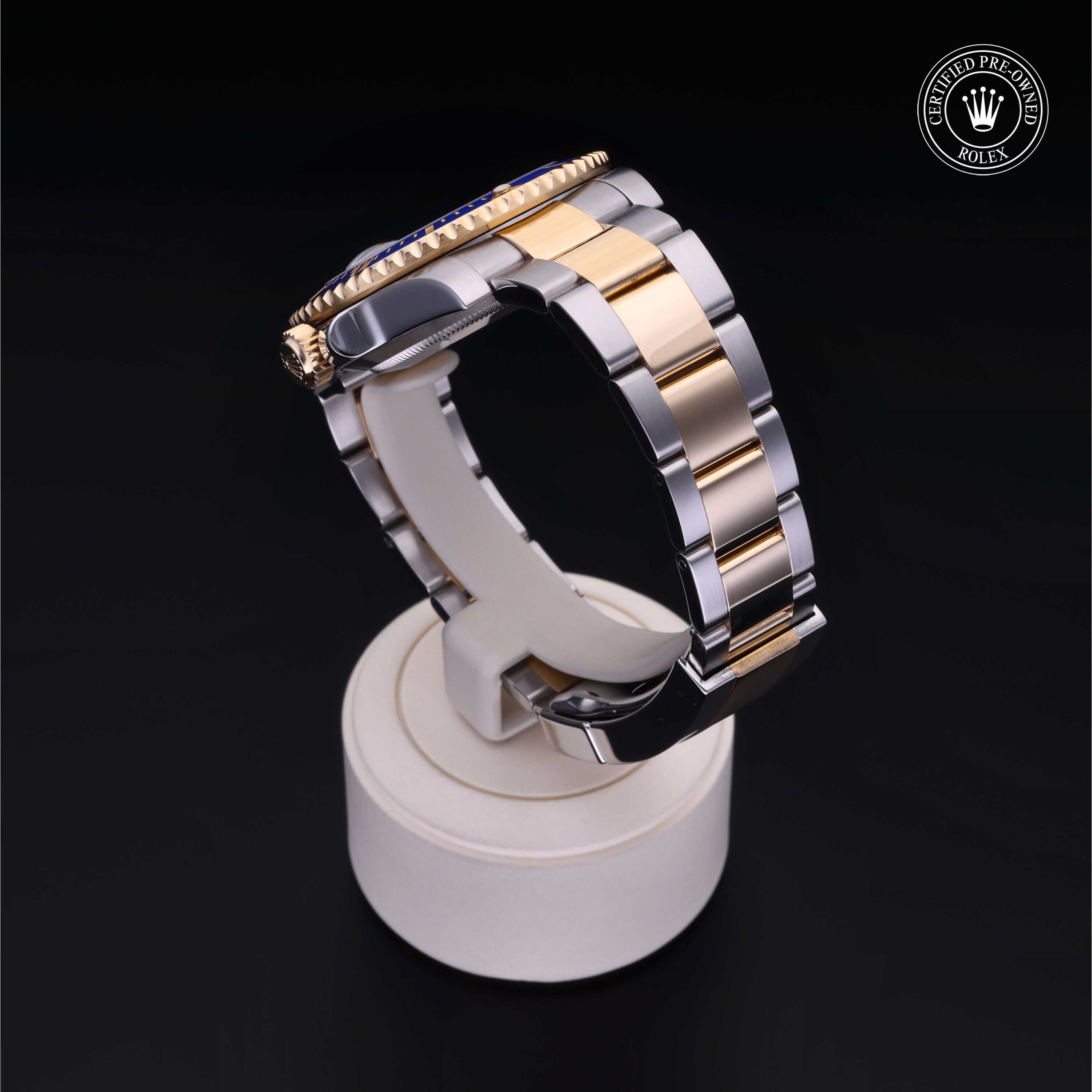 Rolex Certified Pre-owned Submariner M116613LB-0005 front on black background