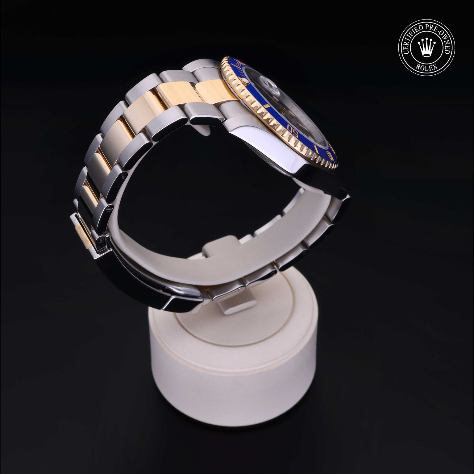 Rolex Certified Pre-owned Submariner M116613LB-0005 front on black background