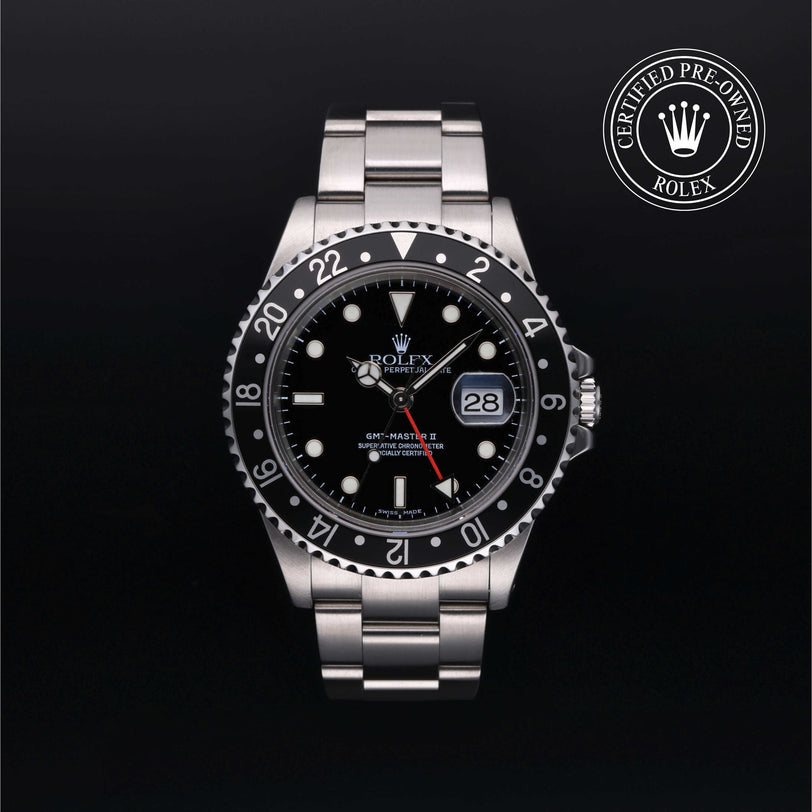 Rolex Certified Pre-owned GMT II M16710LN-0004 front on black background