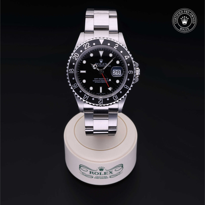 Rolex Certified Pre-owned GMT II M16710LN-0004 front on black background
