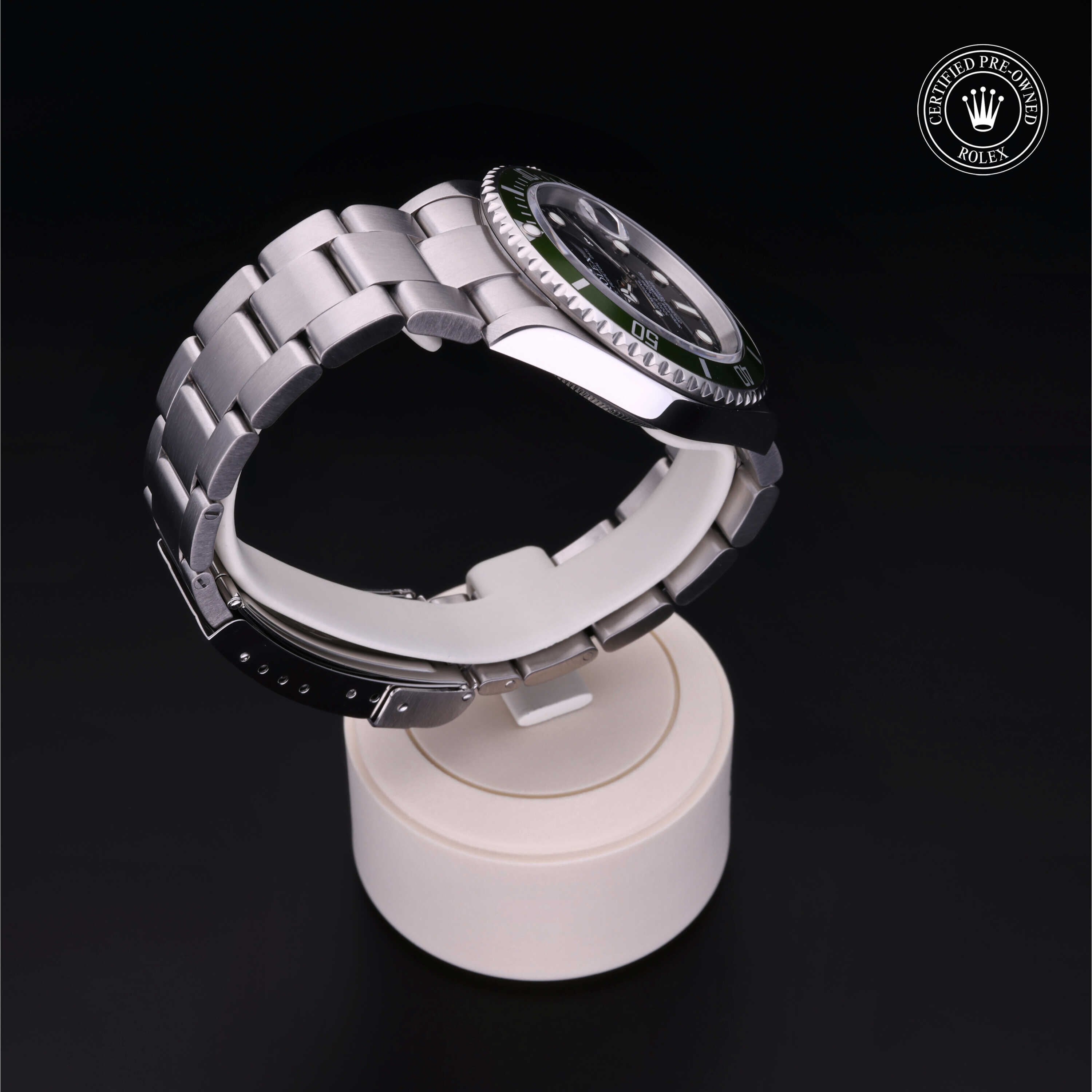 Rolex Certified Pre-owned Submariner Date M16610LV-0002 front on black background