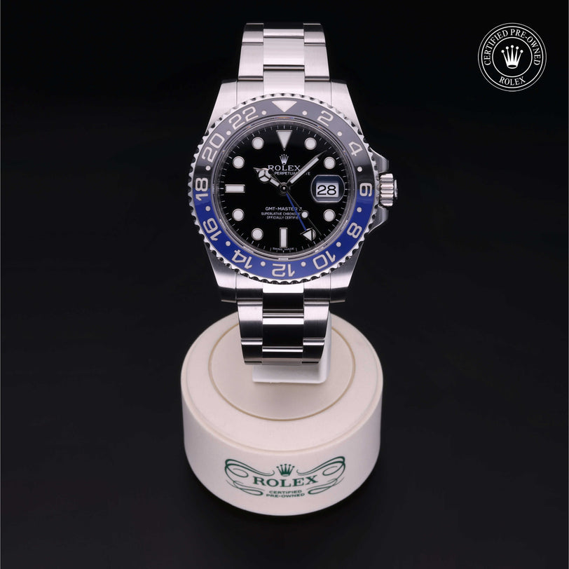 Rolex Certified Pre-owned GMT M116710BLNR-0002 front on black background