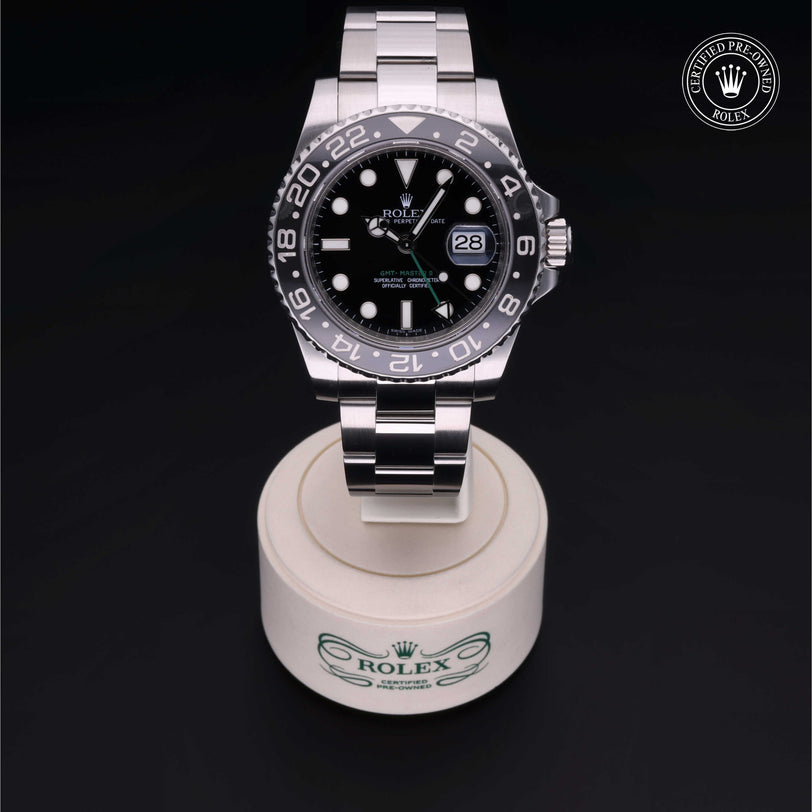 Rolex Certified Pre-owned GMT M116710LN-0001 front on black background