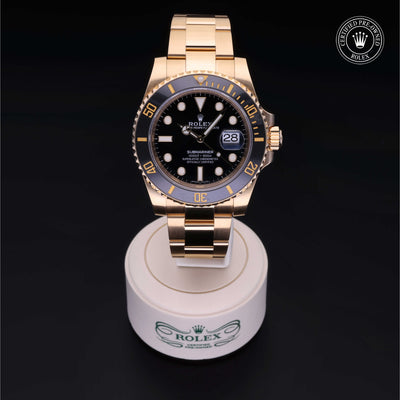 Rolex Certified Pre-owned Submariner M116618LN-0001 front on black background