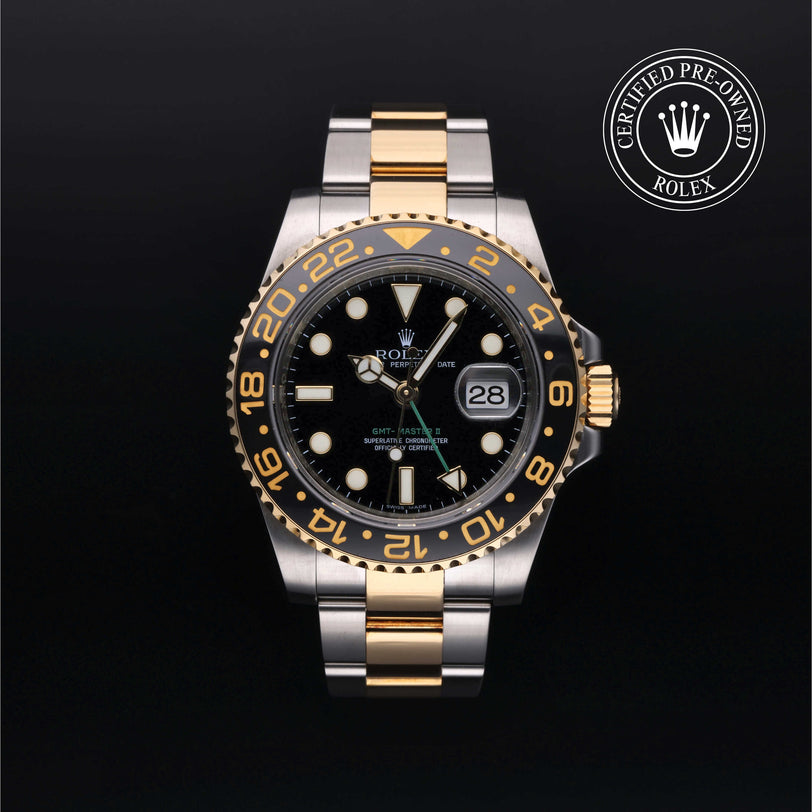 Rolex Certified Pre-owned GMT M116713LN-0001 front on black background