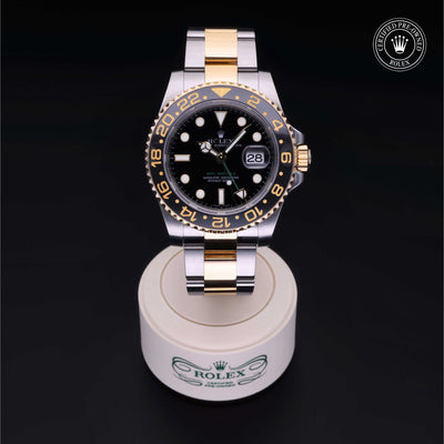 Rolex Certified Pre-owned GMT M116713LN-0001 front on black background