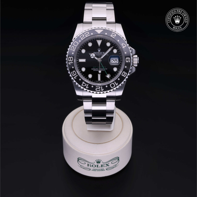 Rolex Certified Pre-owned GMT II M116710LN-0001 front on black background
