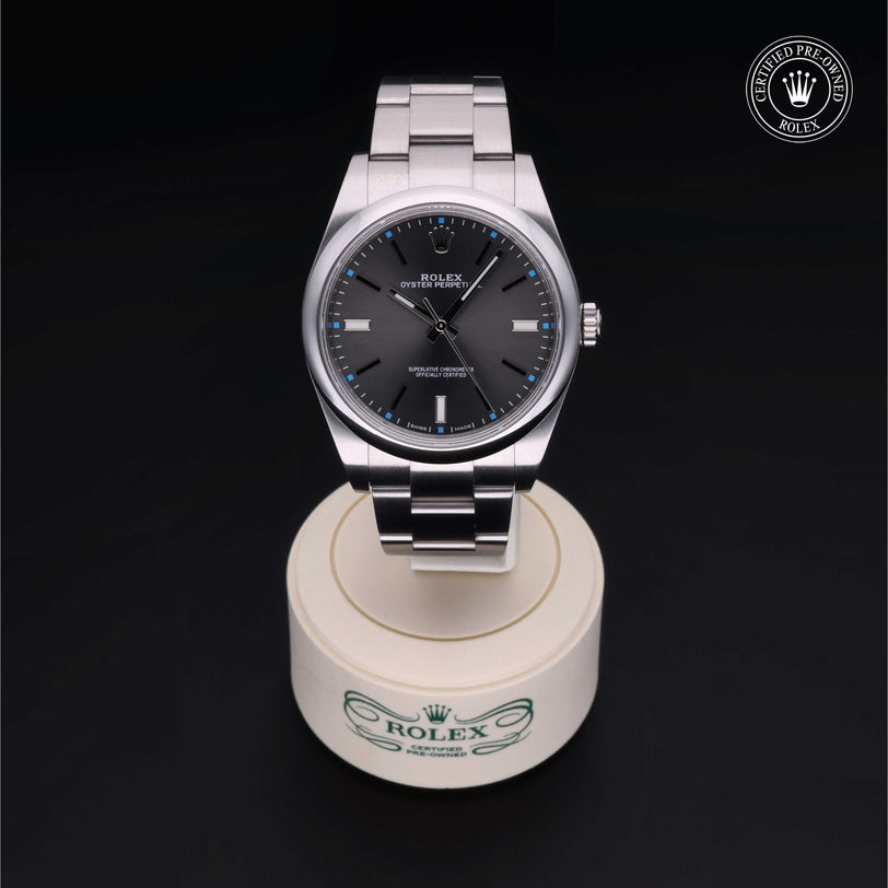 Rolex Certified Pre-owned Oyster Perpetual M114300-0001 front on black background