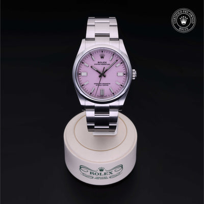 Rolex Certified Pre-owned Oyster Perpetual M126000-0008 front on black background