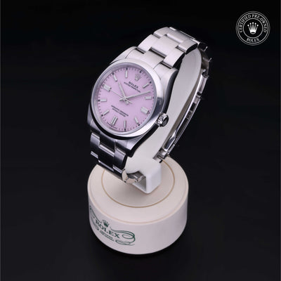 Rolex Certified Pre-owned Oyster Perpetual M126000-0008 front on black background