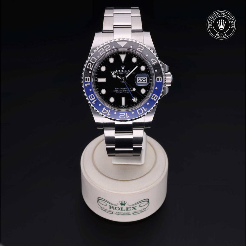 Rolex Certified Pre-owned GMT M116710BLNR-0002 front on black background