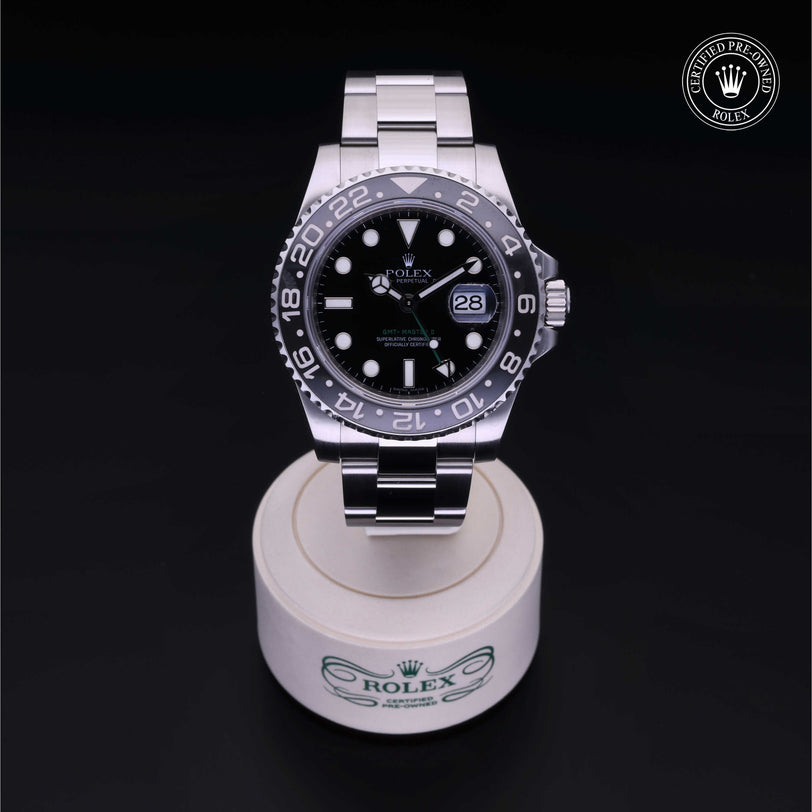 Rolex Certified Pre-owned GMT M116710LN-0001 front on black background