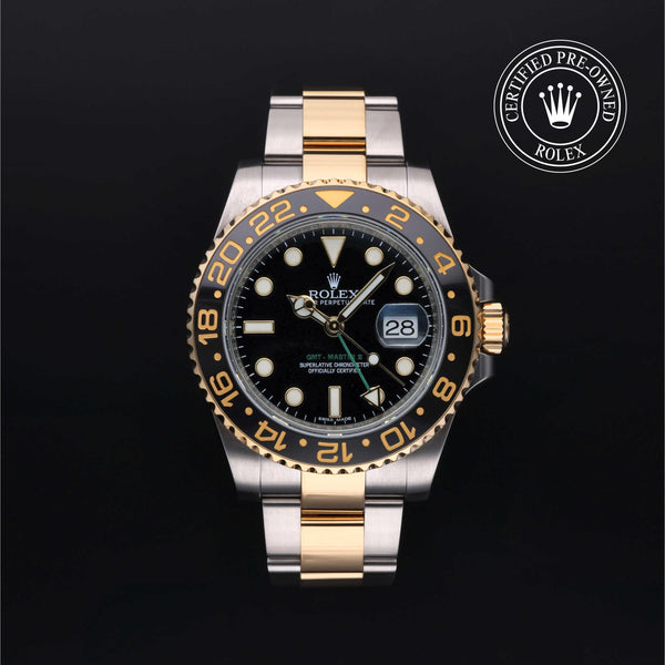 Rolex Certified Pre-owned GMT M116713LN-0001 front on black background