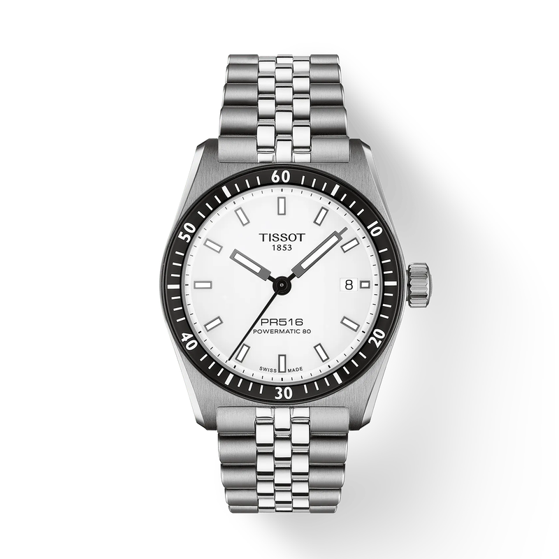 Silver Tissot watch with a white face on a light gray background