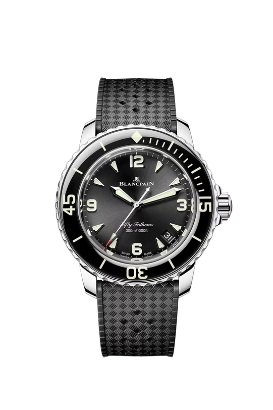 Blancpain Fifty Fathoms watch with sunburst black dial, luminous hands, black rotating bezel, and textured black rubber strap