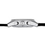 Side view of the Zenith El Primero Limited Edition For Hodinkee wristwatch case in silver, featuring a textured crown and pushers, fitted with a black leather strap, displayed against a white background.