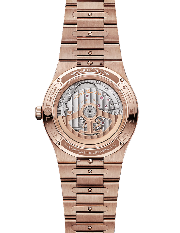 18K pink gold watch with visible skeleton dial showing mechanical movement, date window, and brushed metal bracelet with scre
