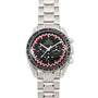 An OMEGA Speedmaster Tintin watch in silver, featuring a black dial with red and white checkered detailing around the edge.