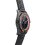 Side view of a Breitling Chronomat Raven wristwatch featuring a black case, orange accent bezel, and black rubber strap.