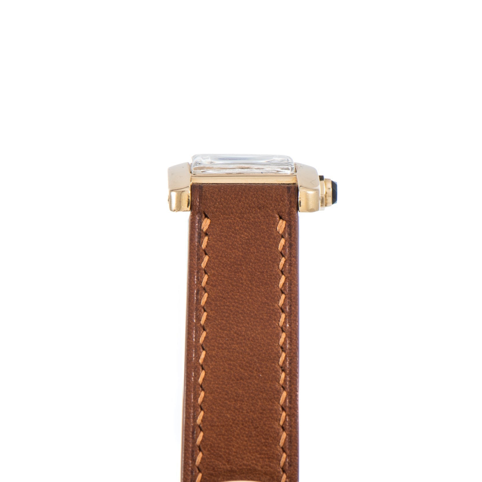 Side view of the Cartier Tank Cintrée Ladies featuring a gold case and brown leather strap with visible stitching.