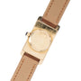 Back view of the Cartier Tank Cintrée Ladies gold watch featuring a brown leather strap and engraved numbers on the case.