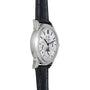The Patek Philippe Perpetual Calendar Moonphase Chronograph features a white dial with multiple subdials and a black leather strap, shown from an angle.