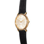Patek Philippe Calatrava Waterproof gold wristwatch with a white dial, black leather strap, and gold hour markers, viewed from an angle.