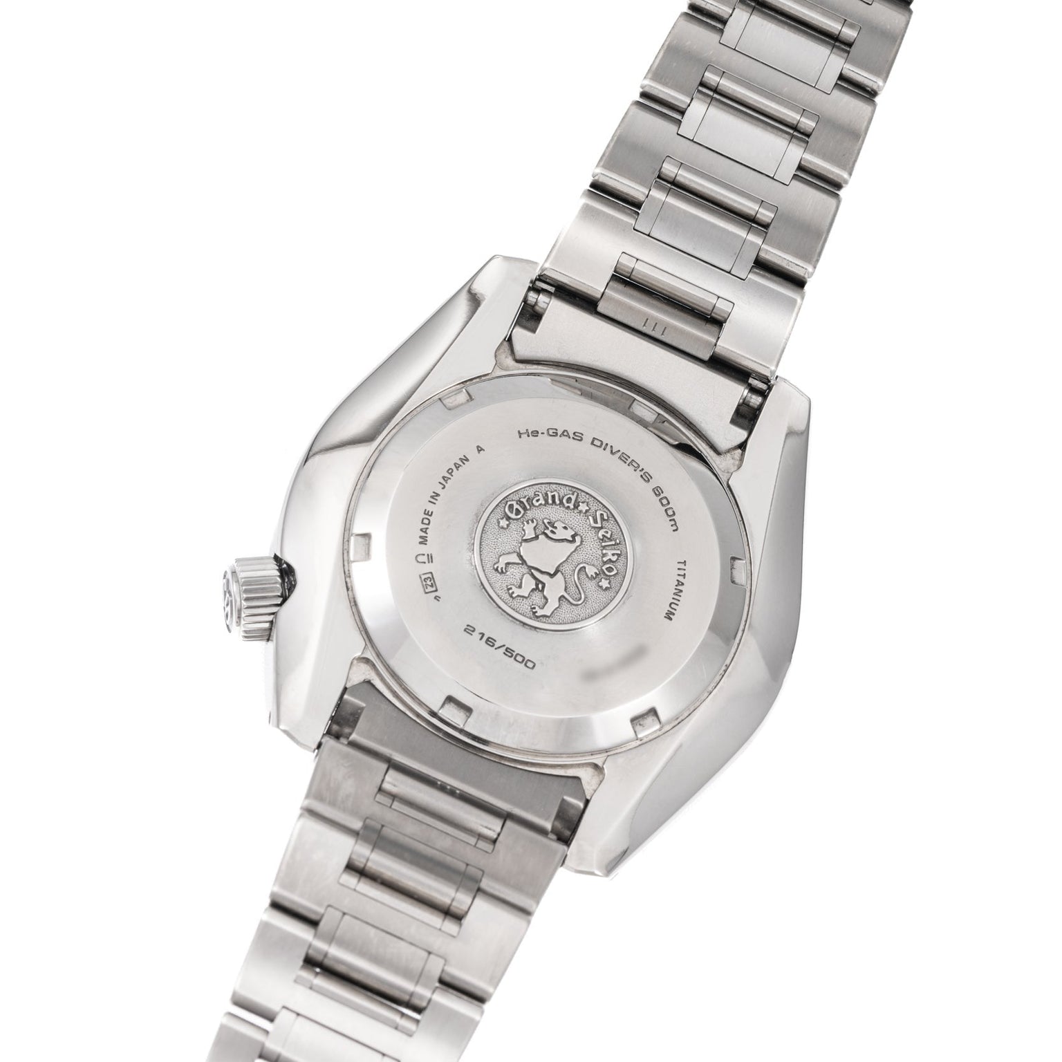 Back view of the Grand Seiko Hi-Beat Professional 600m Divers Limited Edition, featuring engraved details on the stainless steel case and a metal link bracelet.