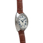 Cartier Cle de Diamond wristwatch with a silver case, brown leather strap, and Roman numerals on the dial, viewed from an angle.