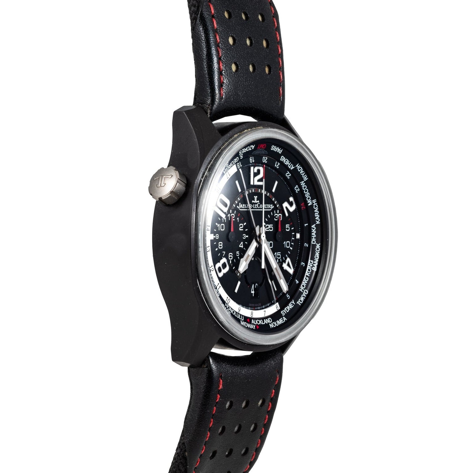 The Jaeger-LeCoultre Amvox 5 World Chronograph wristwatch, by Jaeger-LeCoultre, features a detailed dial, black perforated band with red stitching, and is displayed at an angle.