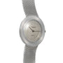 A silver Audemars Piguet Signed Disco Volante Dress Watch Gübelin featuring a mesh band and a minimalistic round face.