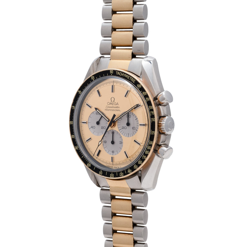 The OMEGA Speedmaster Professional Two-Tone features a champagne dial and a metal link bracelet.