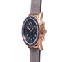 Blancpain Air Command Flyback Chronograph in rose gold with a blue dial, two subdials, and a gray suede strap, shown from the side.