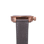Side view of the Blancpain Air Command Flyback Chronograph, featuring a bronze case and gray leather strap, set against a white background.