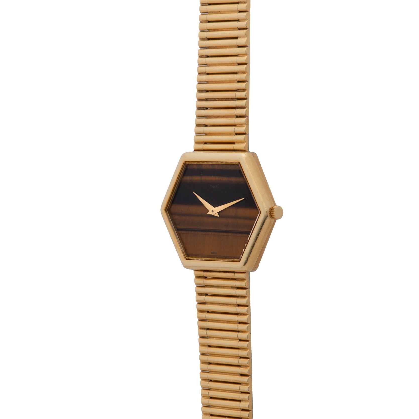 Piaget Hexagonal Tigers Eye wristwatch featuring a brown face and gold metal band, displayed on a white background.