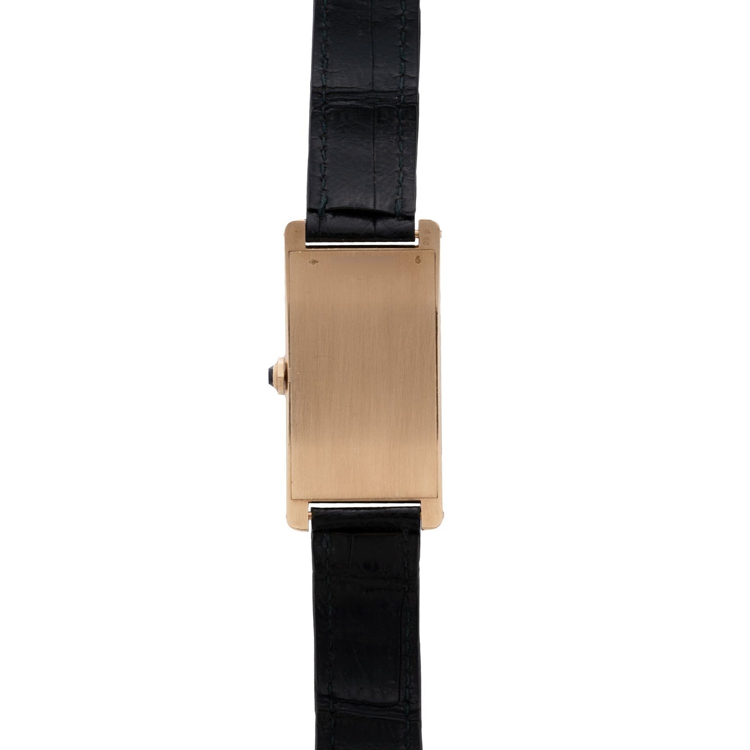 A Cartier Tank Cintrée Jumbo watch with a rectangular gold case and black leather strap, pictured with its face turned away.