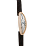 The Cartier Baignoire Allongee is an oval watch featuring a diamond-encrusted case, white dial with Roman numerals, and a black leather strap.