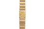 Close-up of a Piaget Polo Square wristwatch featuring a gold rectangular face and a segmented metal band.