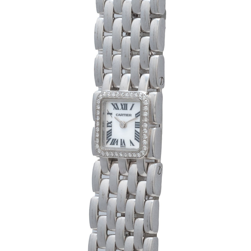 A Cartier Panthère Ruban Mother Of Pearl watch with a rectangular face, Roman numerals, and diamond accents around the bezel.