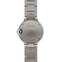 The back of a Cartier Ballon Bleu watch features engraved branding and a Swiss Made inscription on stainless steel.